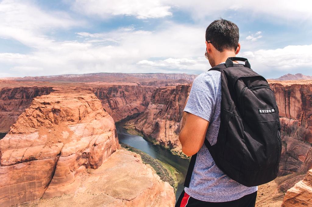 Backpacker enjoying budget travel in European city